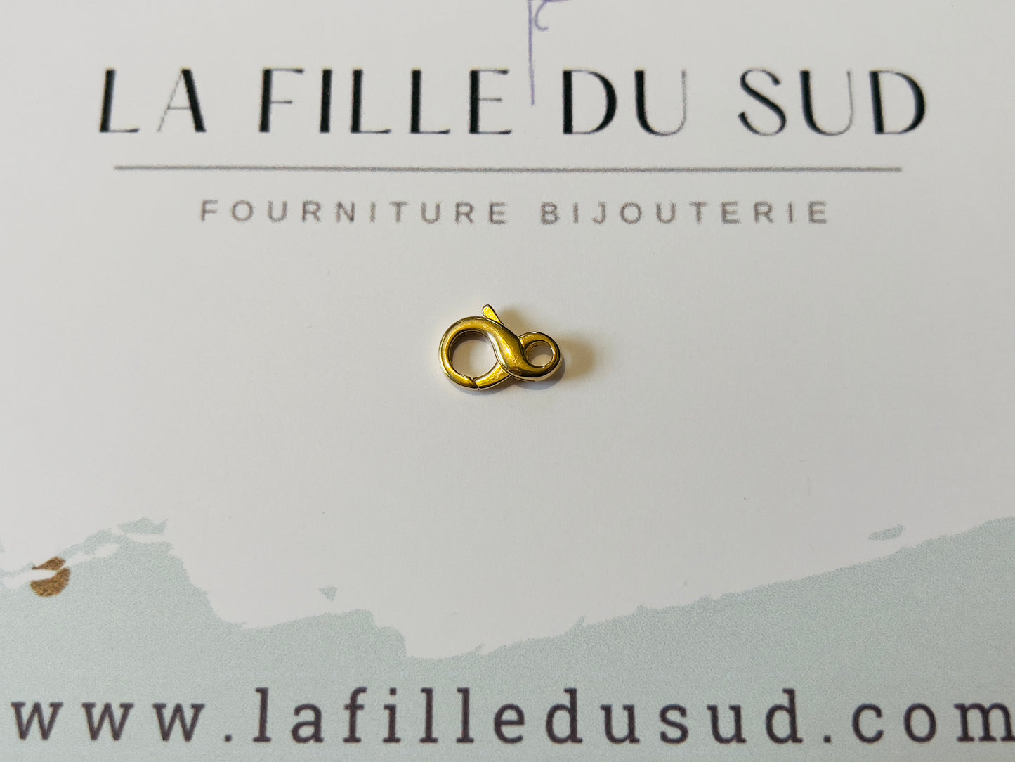 Fermoir mousqueton or 18 carats, forme de l'infini en or jaune 18k 750