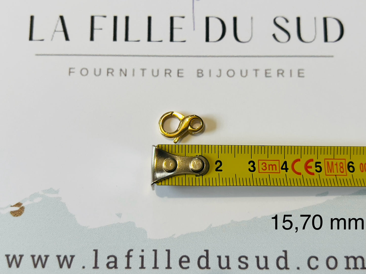 Fermoir mousqueton or 18 carats, forme de l'infini en or jaune 18k 750