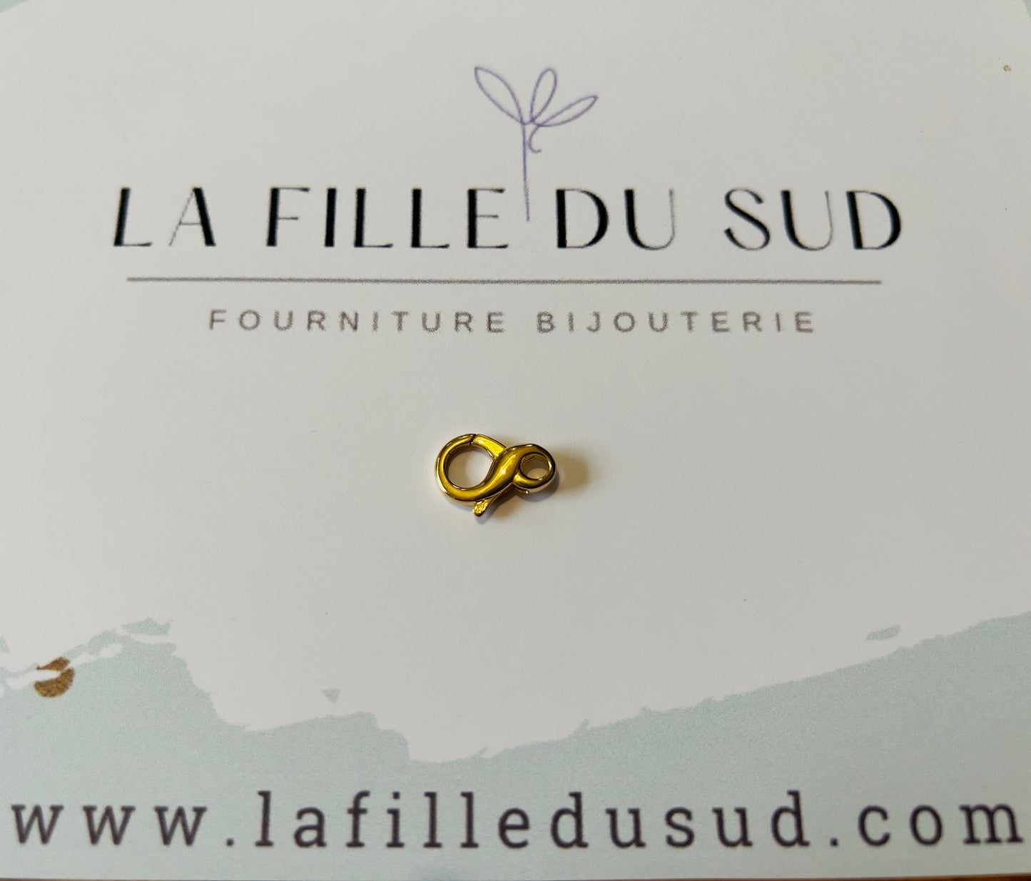 Fermoir mousqueton or 18 carats, forme de l'infini en or jaune 18k 750