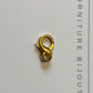 Fermoir mousqueton or 18 carats, forme de l'infini en or jaune 18k 750